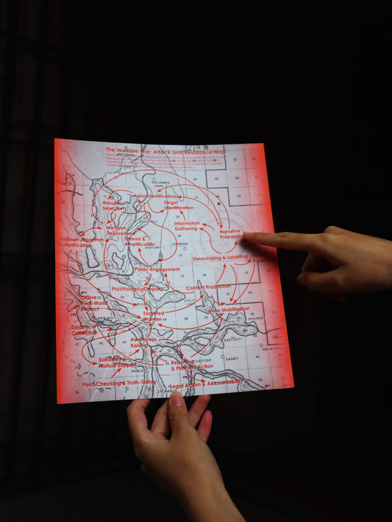 This work transforms online gender-based violence into an “Attack and Resistance Map.” Its arrows connect actor identification, information gathering, content production, platform amplification, public engagement, and real-world harm, showing how online abuse develops and expands. It also maps paths of resistance—including reporting, mutual support, fact-checking, and legal action—through which women regain support and agency.