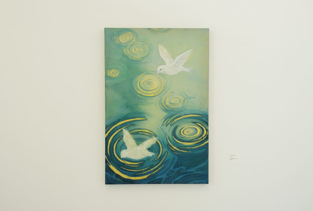 A painting on silk in which a crumpled piece of paper in the lower-left area resembles a flying bird, while a realistically painted pigeon appears in the upper-right. Gold-leaf ripples spread across the surrounding blue water.