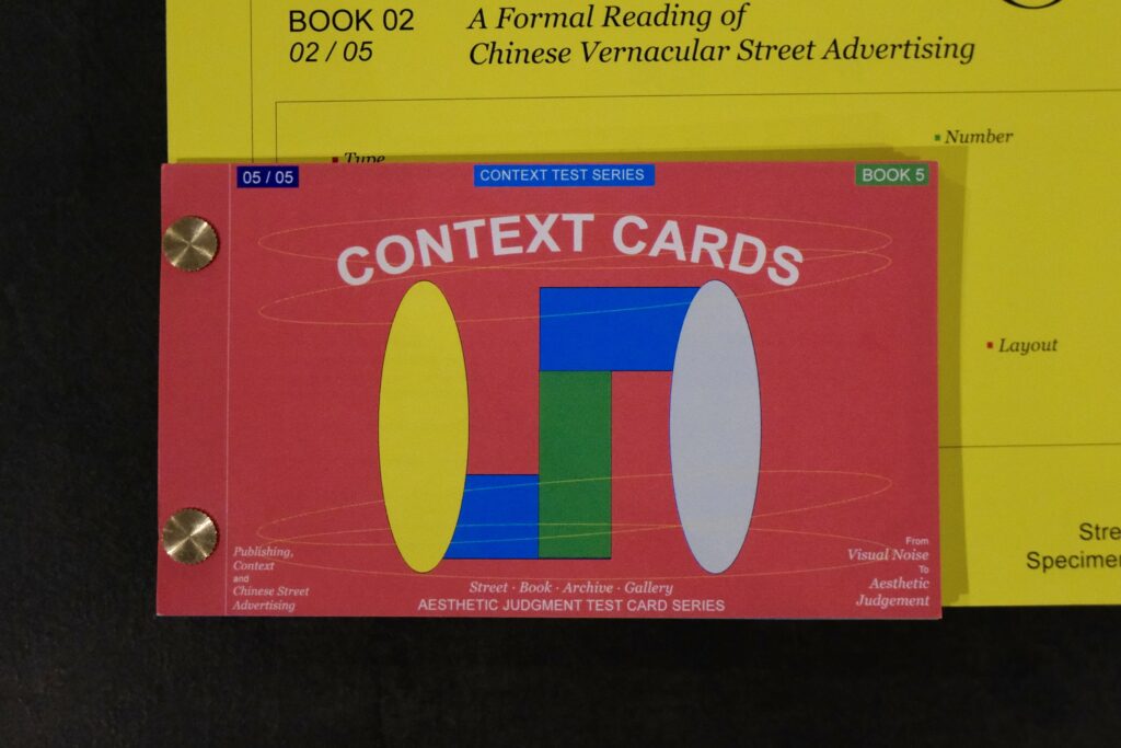 The cover of Context Cards, featuring bright pink, yellow, blue and white geometric shapes.