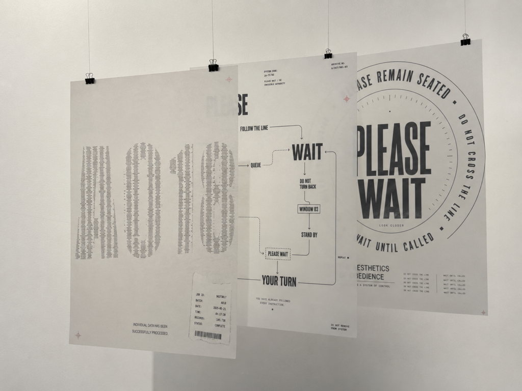 Three translucent tracing-paper posters from the PLEASE WAIT project layered directly on top of one another, allowing administrative numbers, directional graphics and the words “PLEASE WAIT” to remain visible through the overlapping sheets.