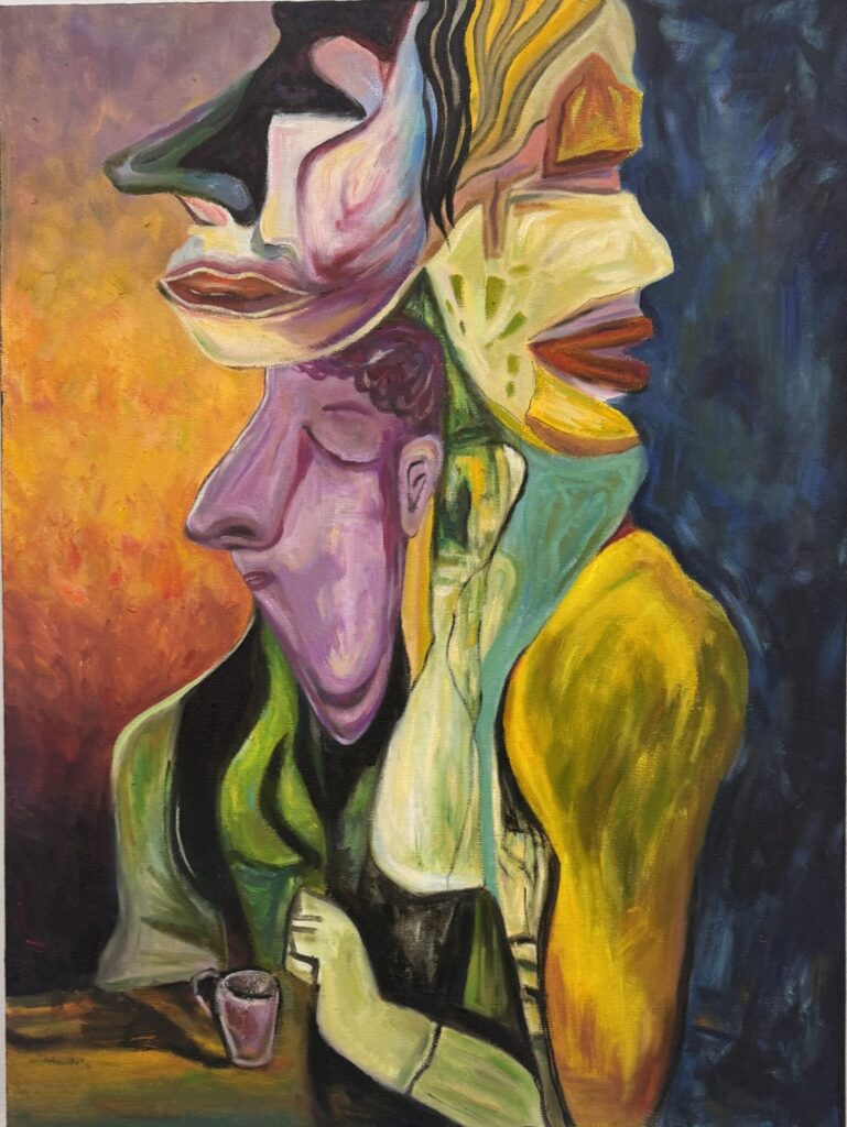 Oil painting titled *Manufactured Identities* (2026) by Cong Chen. Several distorted human faces and bodies overlap and merge into a single crowded figure, painted in vivid purple, yellow, green, orange and blue. The fragmented profiles face different directions, suggesting multiple identities occupying the same social space. A small cup rests on a table at the bottom, referencing the café setting that inspired the work and its exploration of identity, belonging and social conformity.