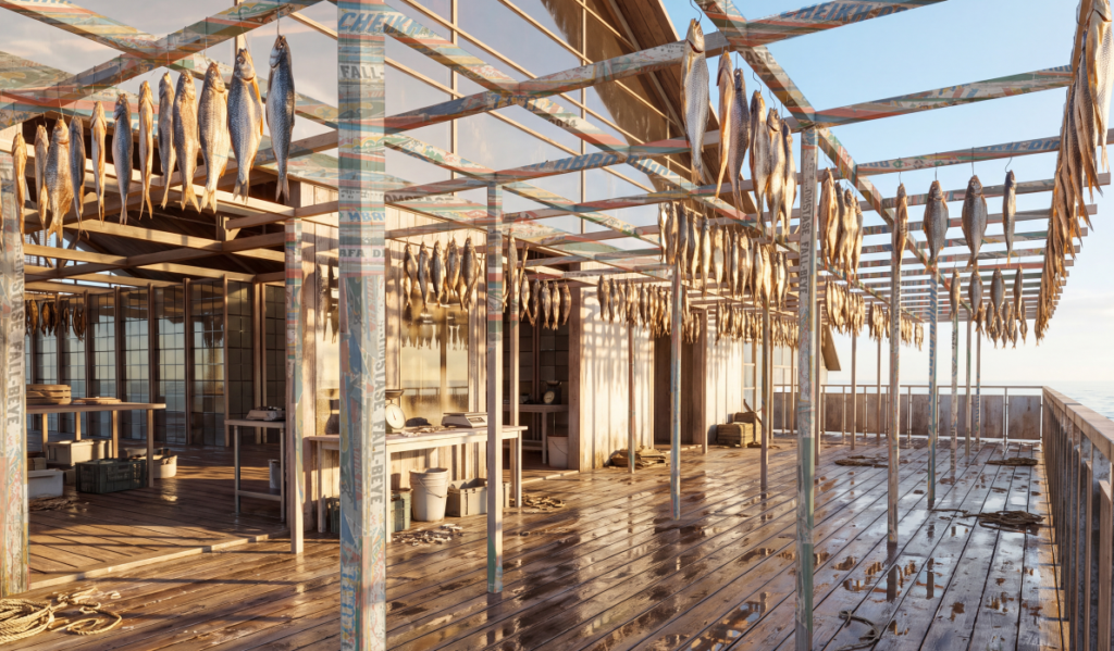 Fish hanging to dry under a timber frame made from reused pirogue wood on an open balcony beside the sea.