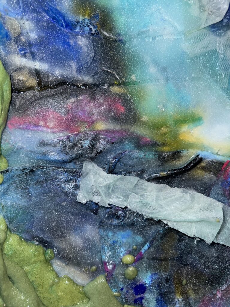 Detail view of Retreatung Surface, 2026, showing translucent soap, UV resin, organza, foam and airbrushed material textures.