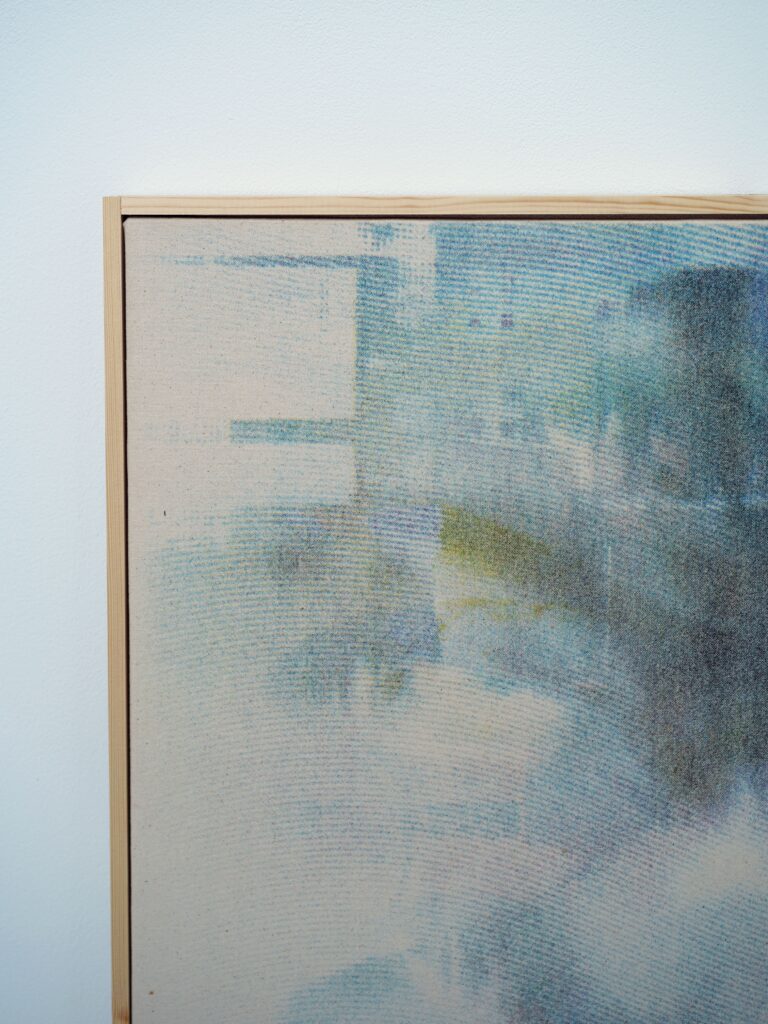 Detail view of A Slow Vanishing, 2026, showing pale layered screenprinted imagery, soft blue-grey tones and partially obscured forms on canvas.