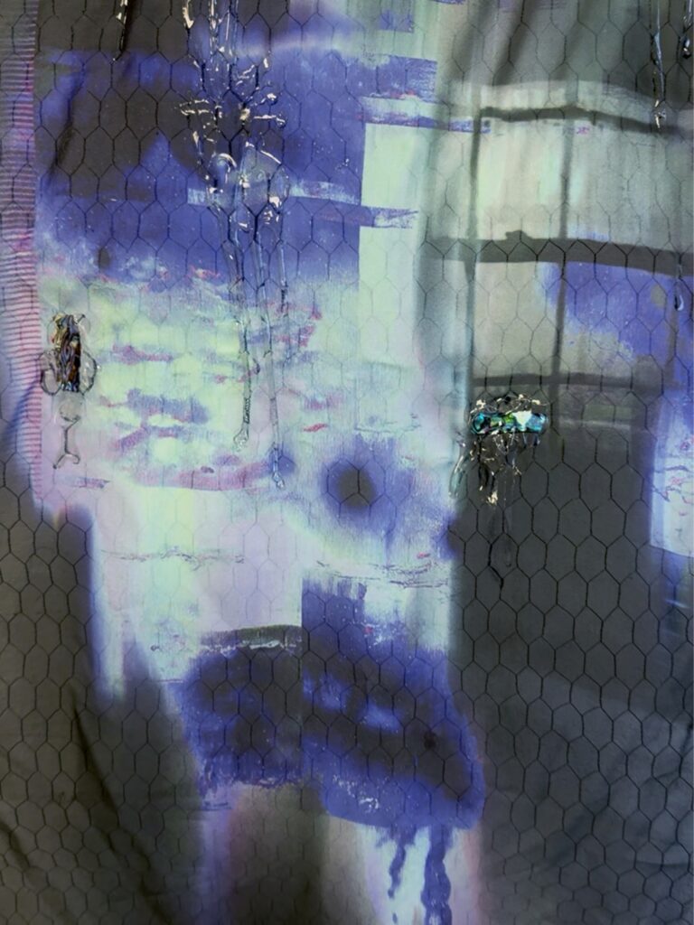 Detail view of Blue Hush, 2026, showing layered blue-toned imagery, fragmented forms and textured mixed-media surfaces.