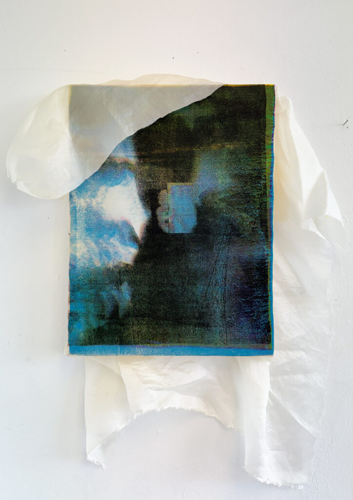 Misregistered Gaze, 2026. A screenprint on translucent veil featuring layered facial imagery, fragmented forms and visual misalignment.