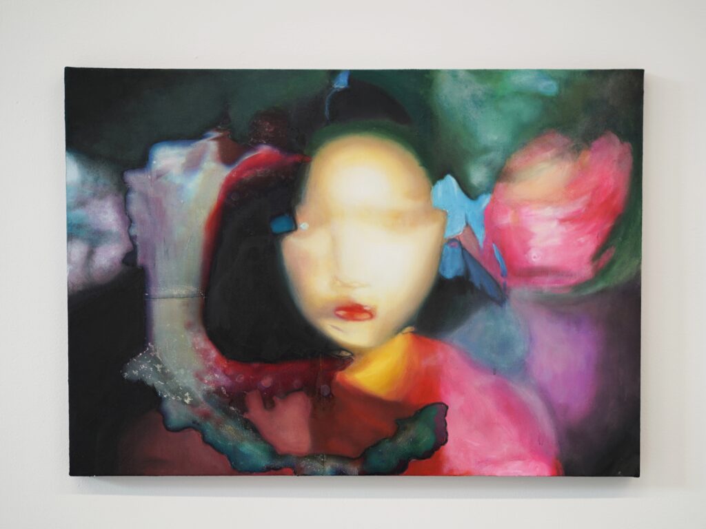 Between Speech and Silence, 2026. An acrylic and photo transfer work on canvas featuring a fragmented face, layered imagery and partially obscured facial features.