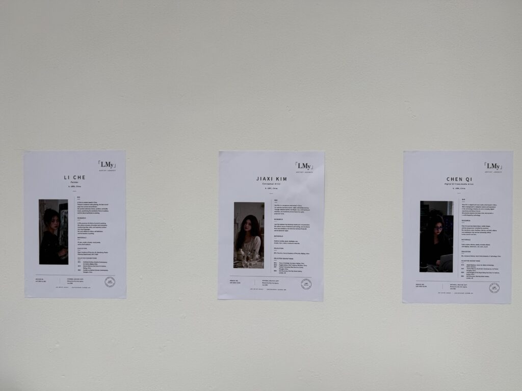 Three fictional artist profiles for Li Che, Jiaxi Kim and Chen Qi displayed on the gallery wall.