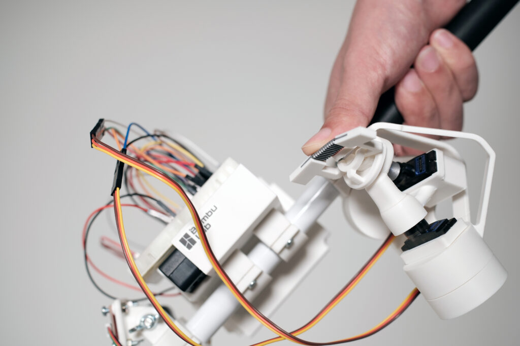 A Thumb-based environmental sensing device for VisuaIIy impaired individuals